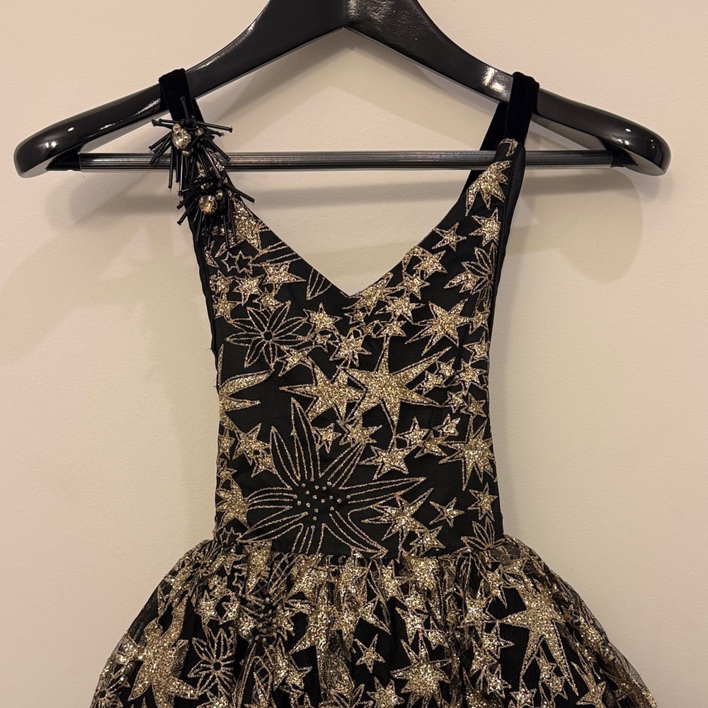 Little Girl's Black and Gold Star Patterned Formal Dress - Picture 6 of 14
